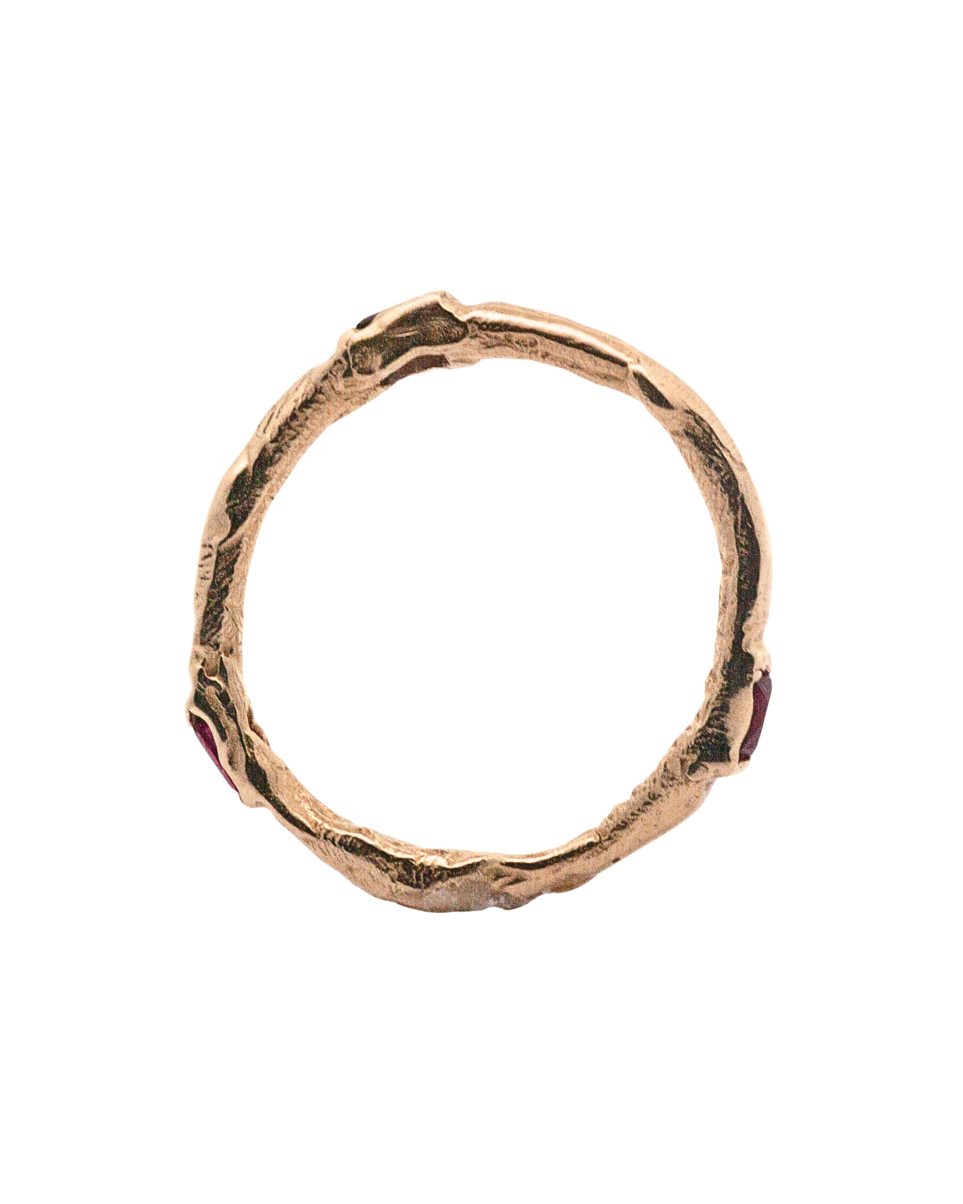 Close-up of Hand-Carved EINAR Ring Featuring Ruby Accents