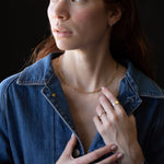 Close-up of Hand-Carved SIGR WATER Ring Showcasing Textured Finish