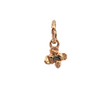 Close-up of IDUN charm showcasing hand-carved floral details