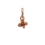 IDUN charm in 14k gold with four-petal flower design by Siri Hansdotter