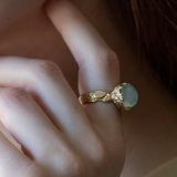 aqamarine statement ring with carved flowers cast in 14K gold
