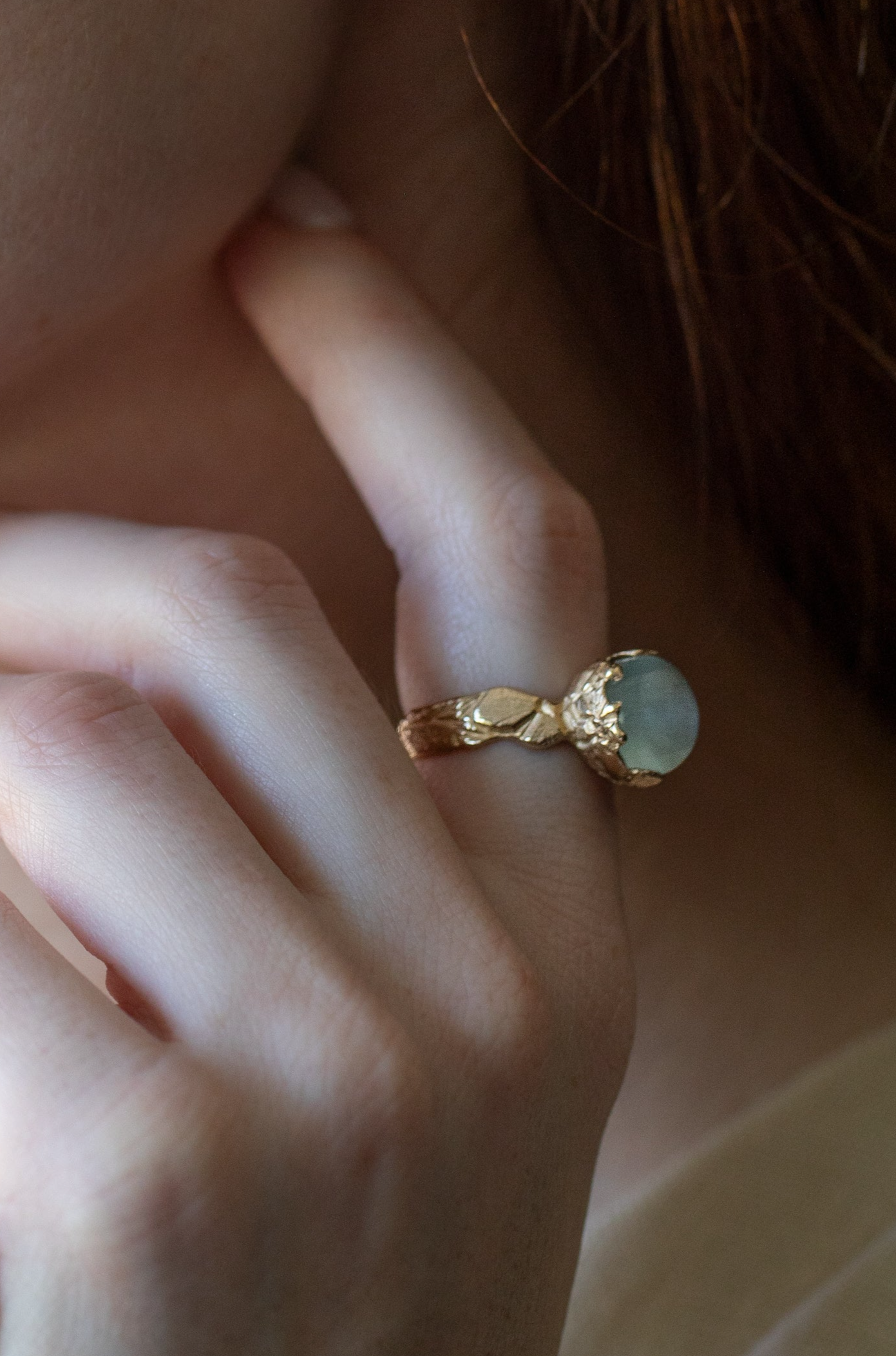 aqamarine statement ring with carved flowers cast in 14K gold