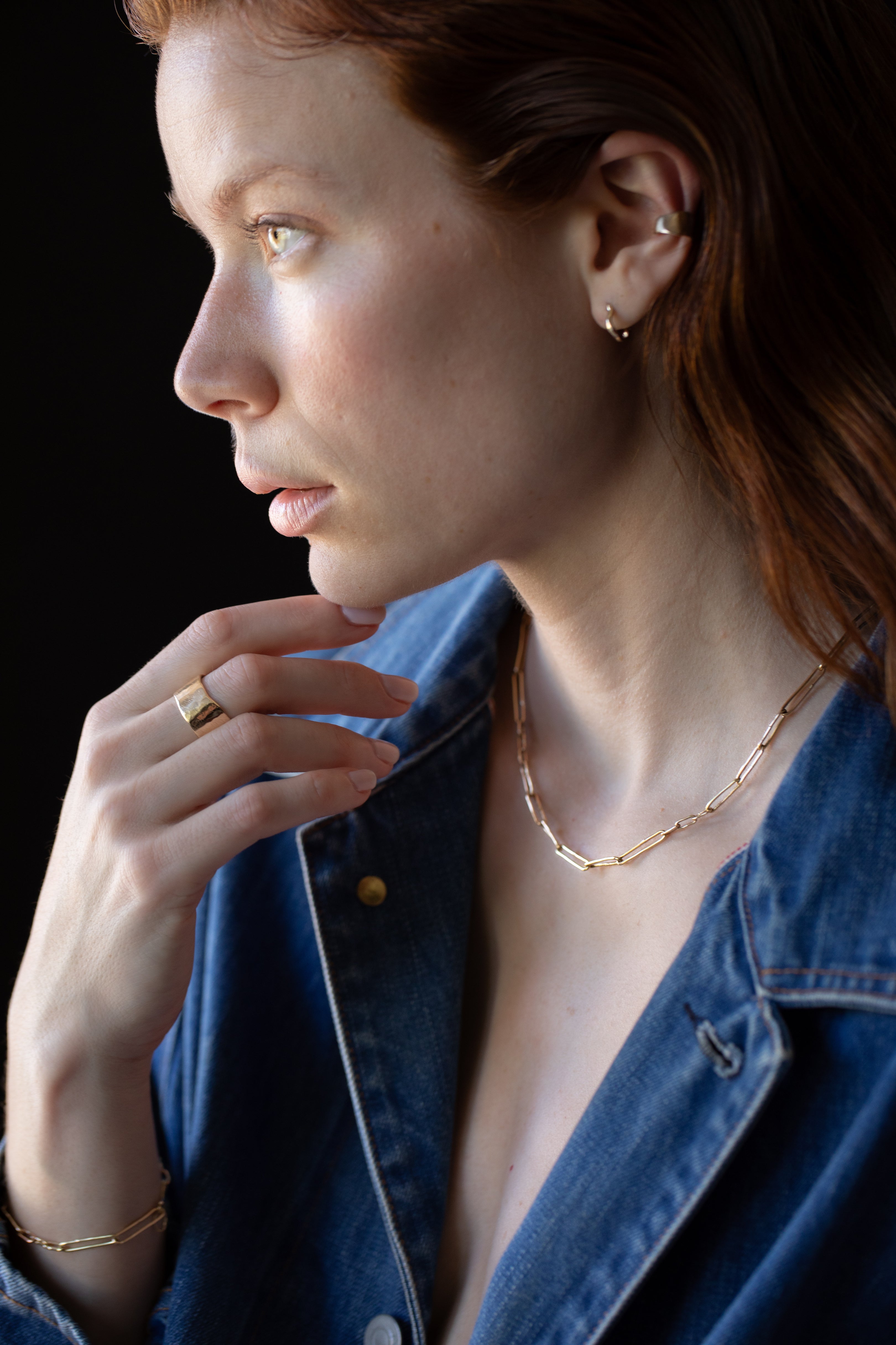Side View of JONSI Necklace Highlighting Hand-Shaped Links
