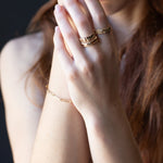 Side View of WESTERN FLORAL Band Ring Highlighting Undulating Form