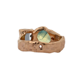 Side view of No. 84 OOAK Ring highlighting pear-shaped sapphire and portrait cut spinel