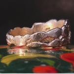 Close-up of Hand-Carved ERNA Ring Showcasing Textured Finish