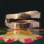 Close-up of Hand-Carved TWO RIVERS Ring Showcasing Textured Finish