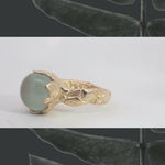 Close-up of Hand-Carved FRIDA Ring Showcasing Floral Design and Hammered Texture