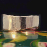 Close-up of Hand-Carved SIGR WATER Medium Band Ring with Wavy Edge