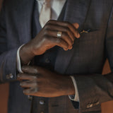 Model Wearing SIGR WATER Wide Band Ring with Elegant Style