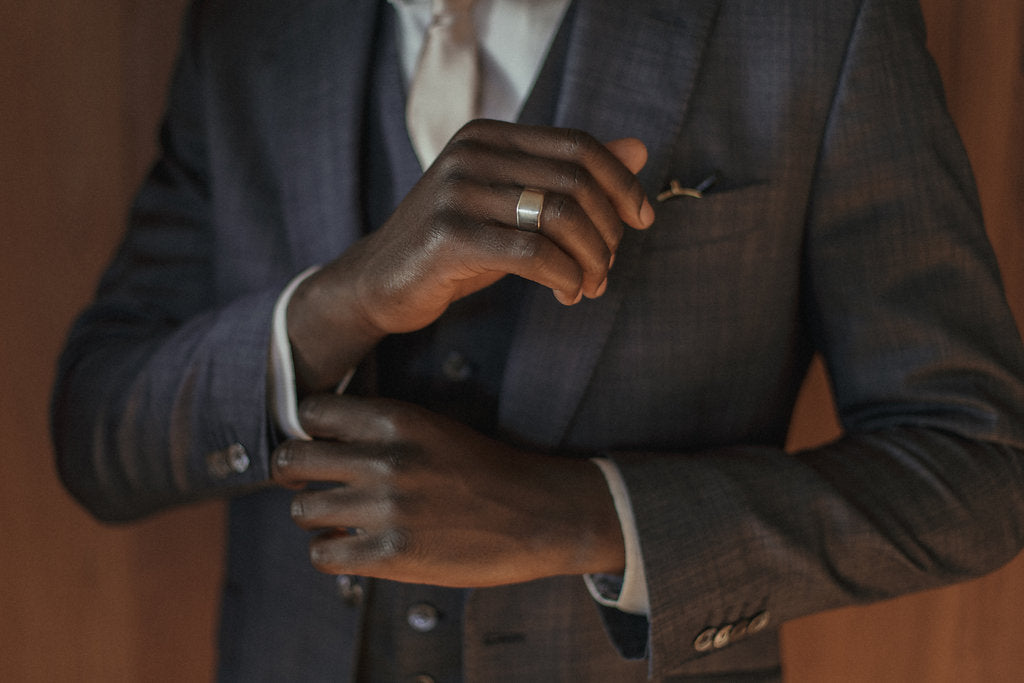 Model Wearing SIGR WATER Wide Band Ring with Elegant Style