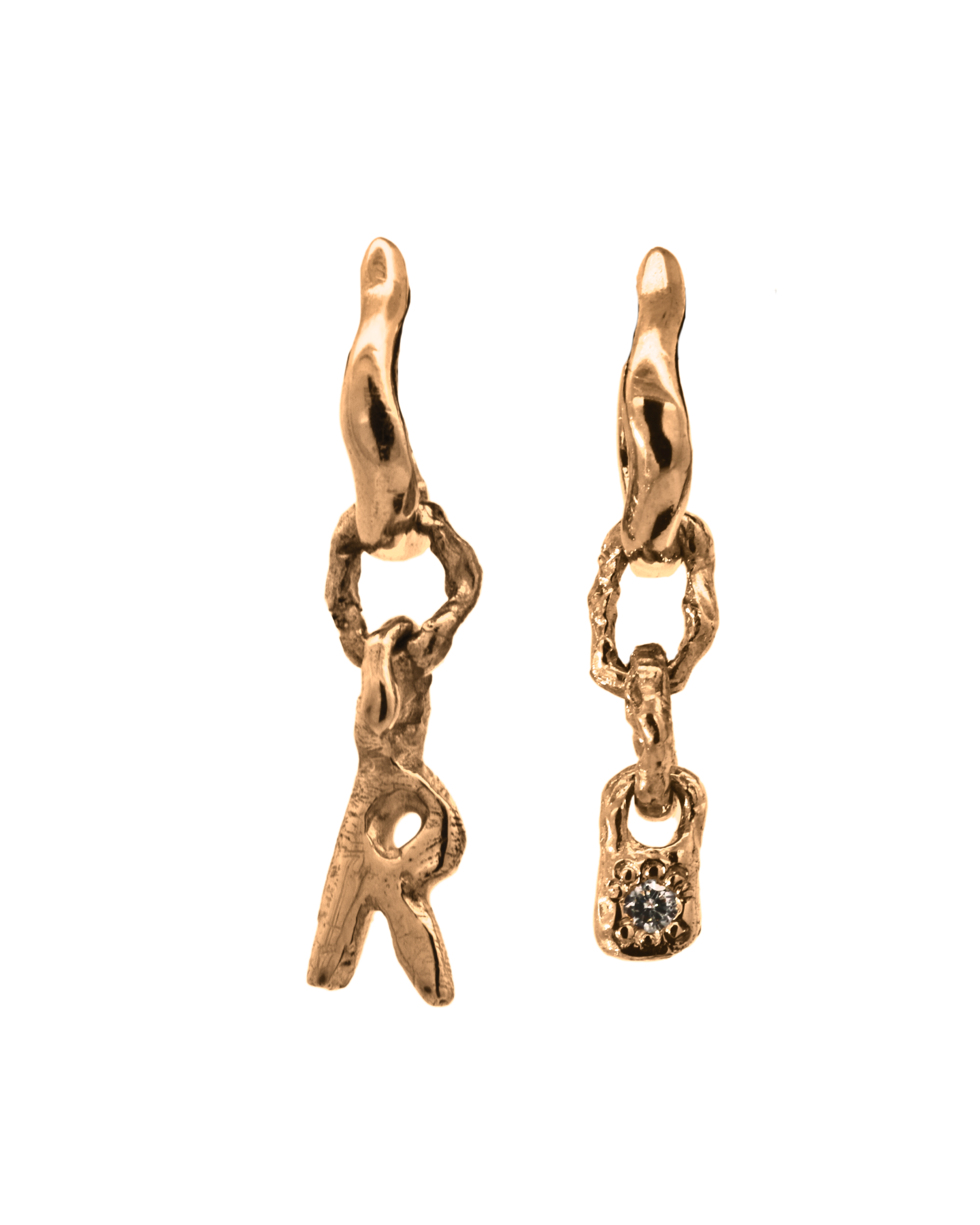 Close-up of Hand-Carved BB Charm with Montana Sapphire