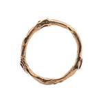 Close-up of Hand-Carved EINAR Ring Featuring Ruby Accents

