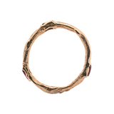 Close-up of Hand-Carved EINAR Ring Featuring Ruby Accents

