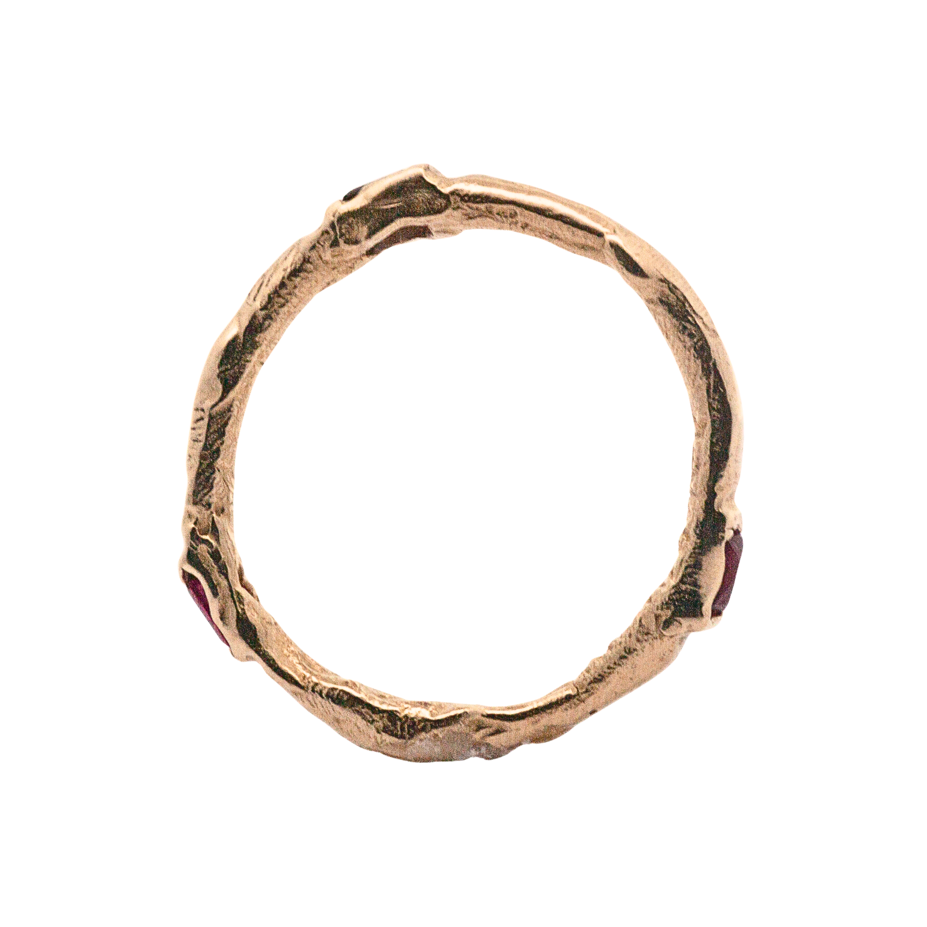 Close-up of Hand-Carved EINAR Ring Featuring Ruby Accents

