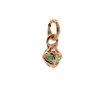 Close-up of Hand-Carved Emerald Charm with Sculptural Design