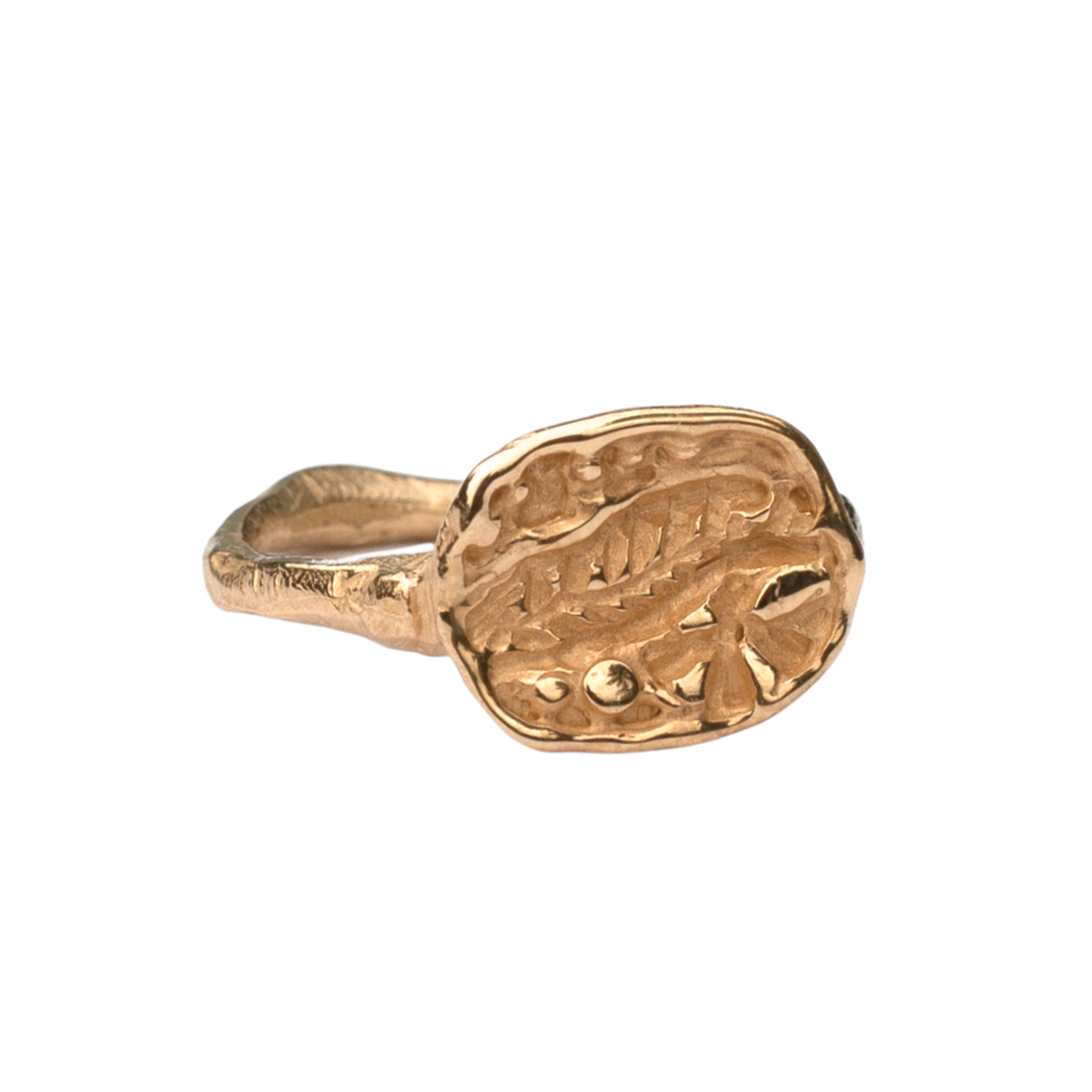 Close-up of Hand-Carved FRIKA Ring Featuring Fossil Fern and Floral Design


