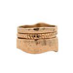 Close-up of SIGR WATER ring showcasing scuffed and hammered texture