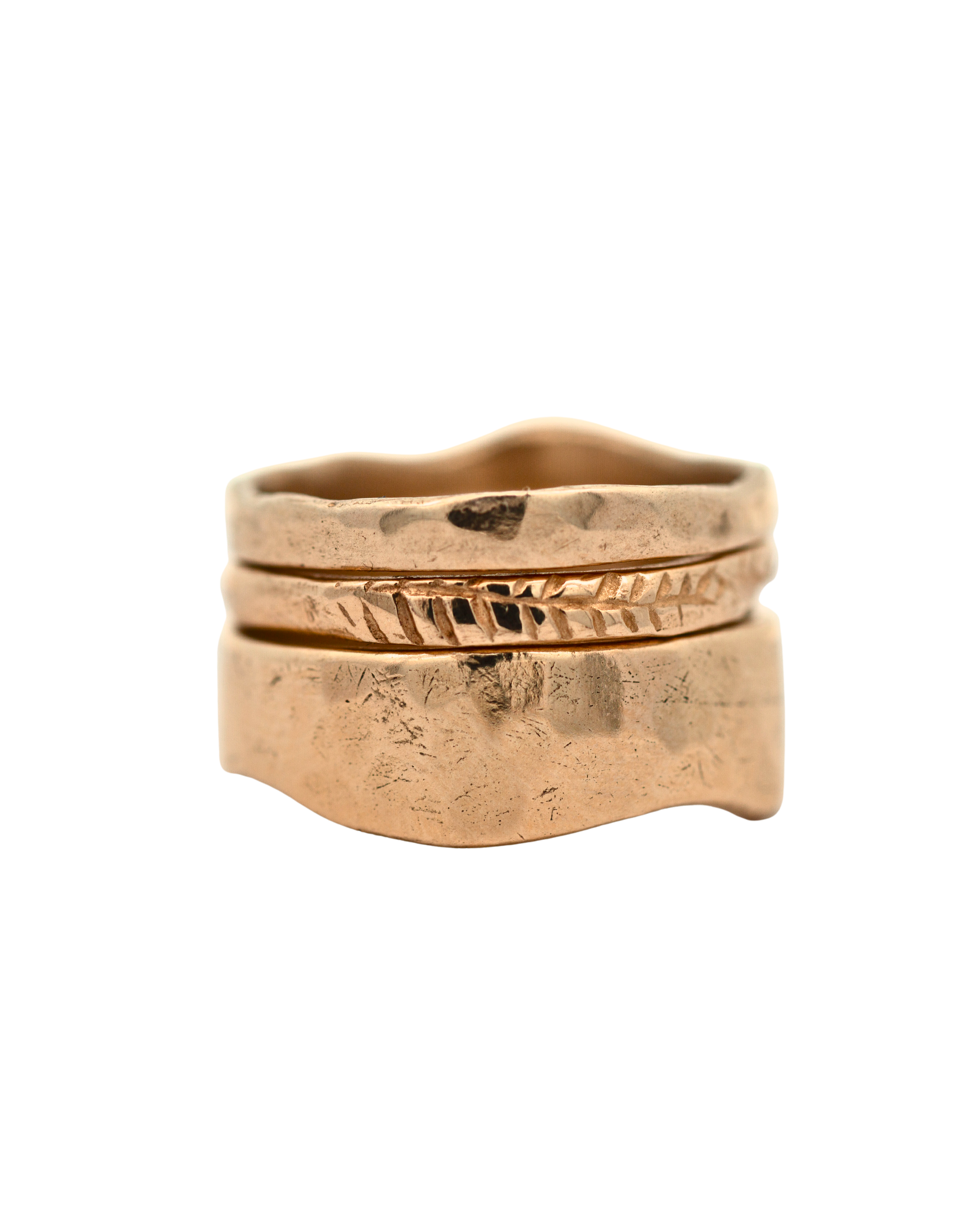 Close-up of SIGR WATER ring showcasing scuffed and hammered texture