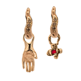 Close-up of left-hand charm showing optional palm-set gemstone