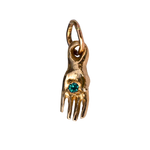 Hand-Carved Mini Holding Charm Showcasing Sculptural Details

