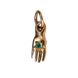 Hand-Carved Mini Holding Charm Showcasing Sculptural Details

