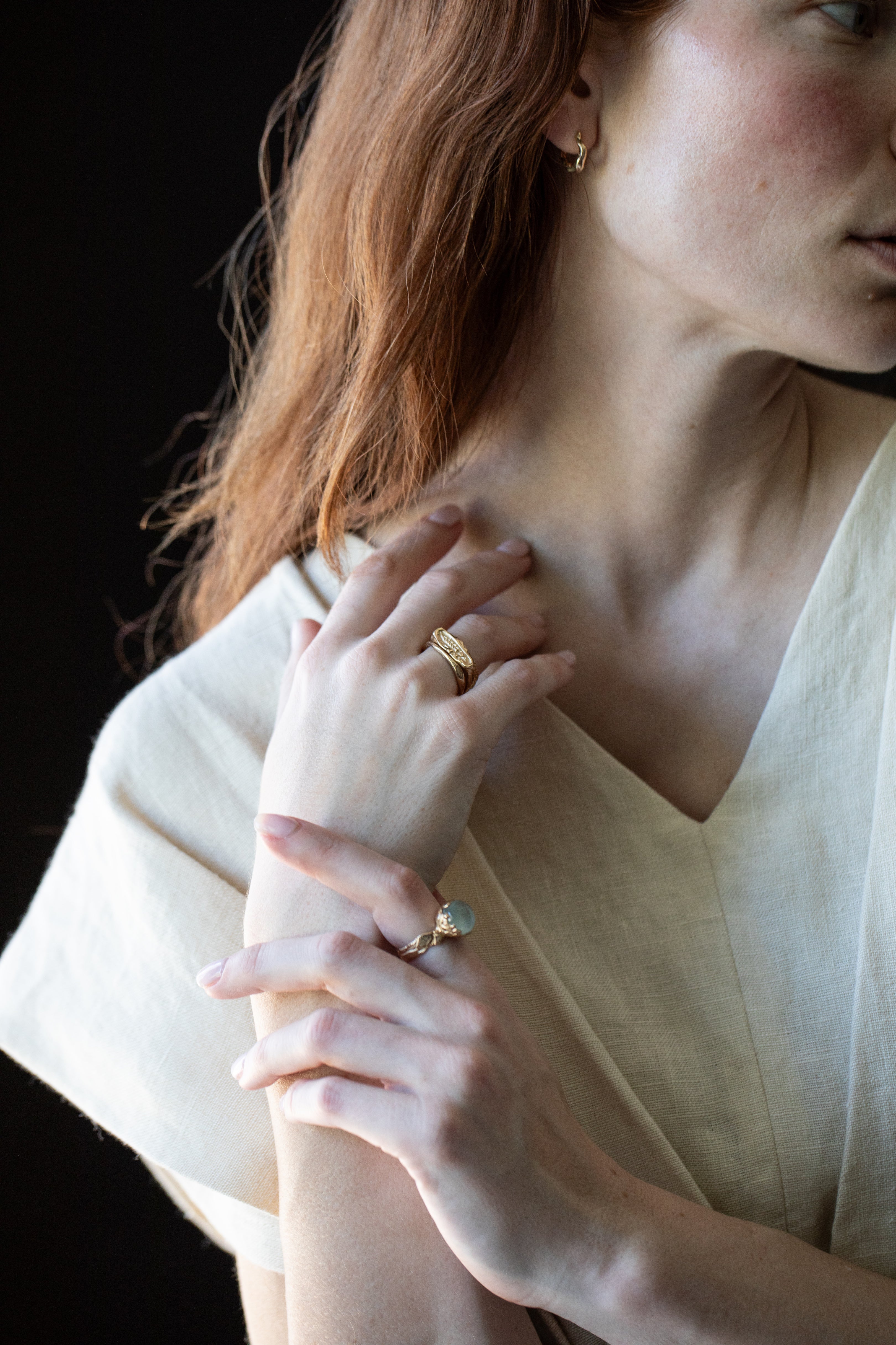 Model wearing TILDA Diamond Huggie Hoop Earrings in rose gold