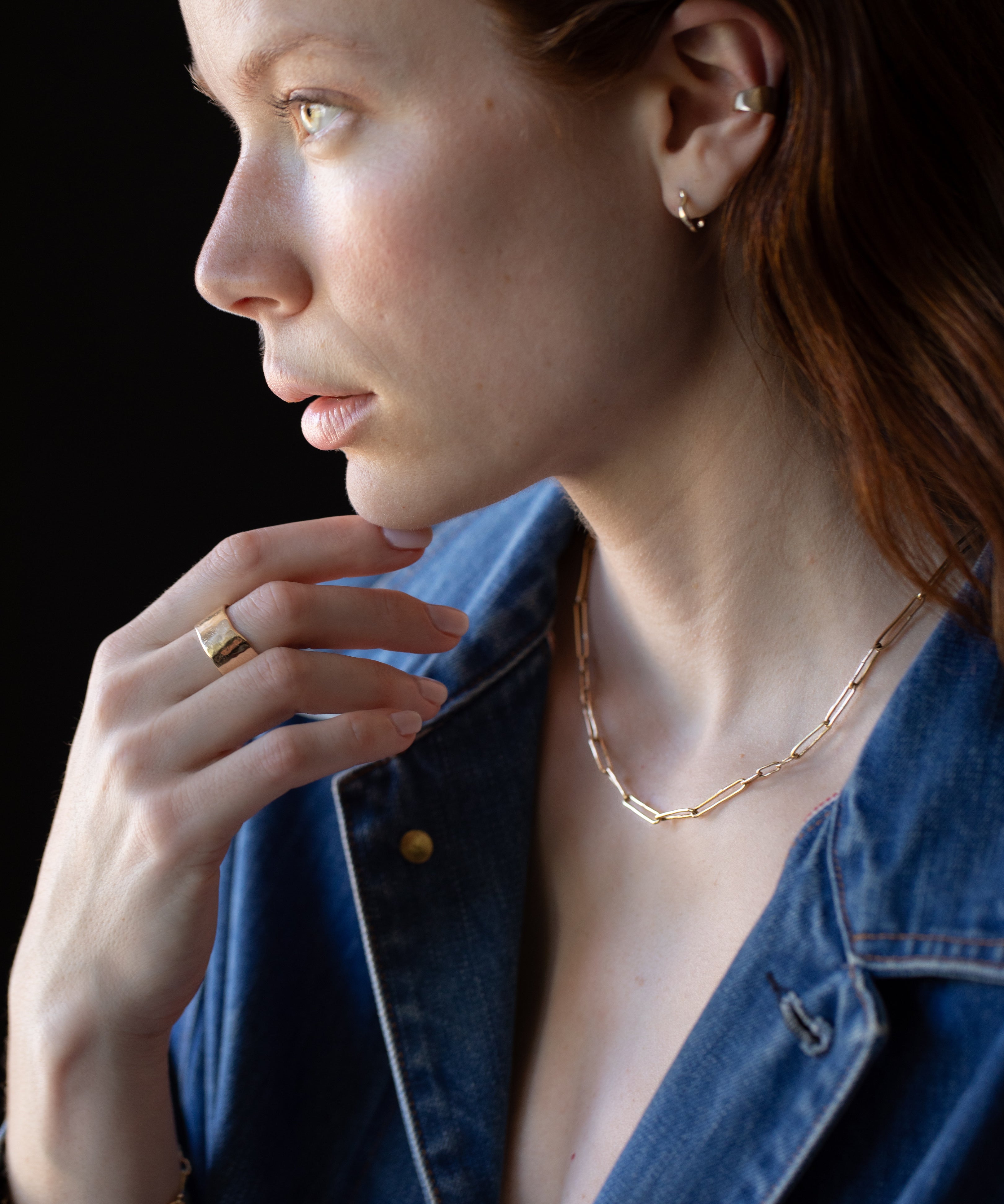Side View of JONSI Necklace Highlighting Hand-Shaped Links