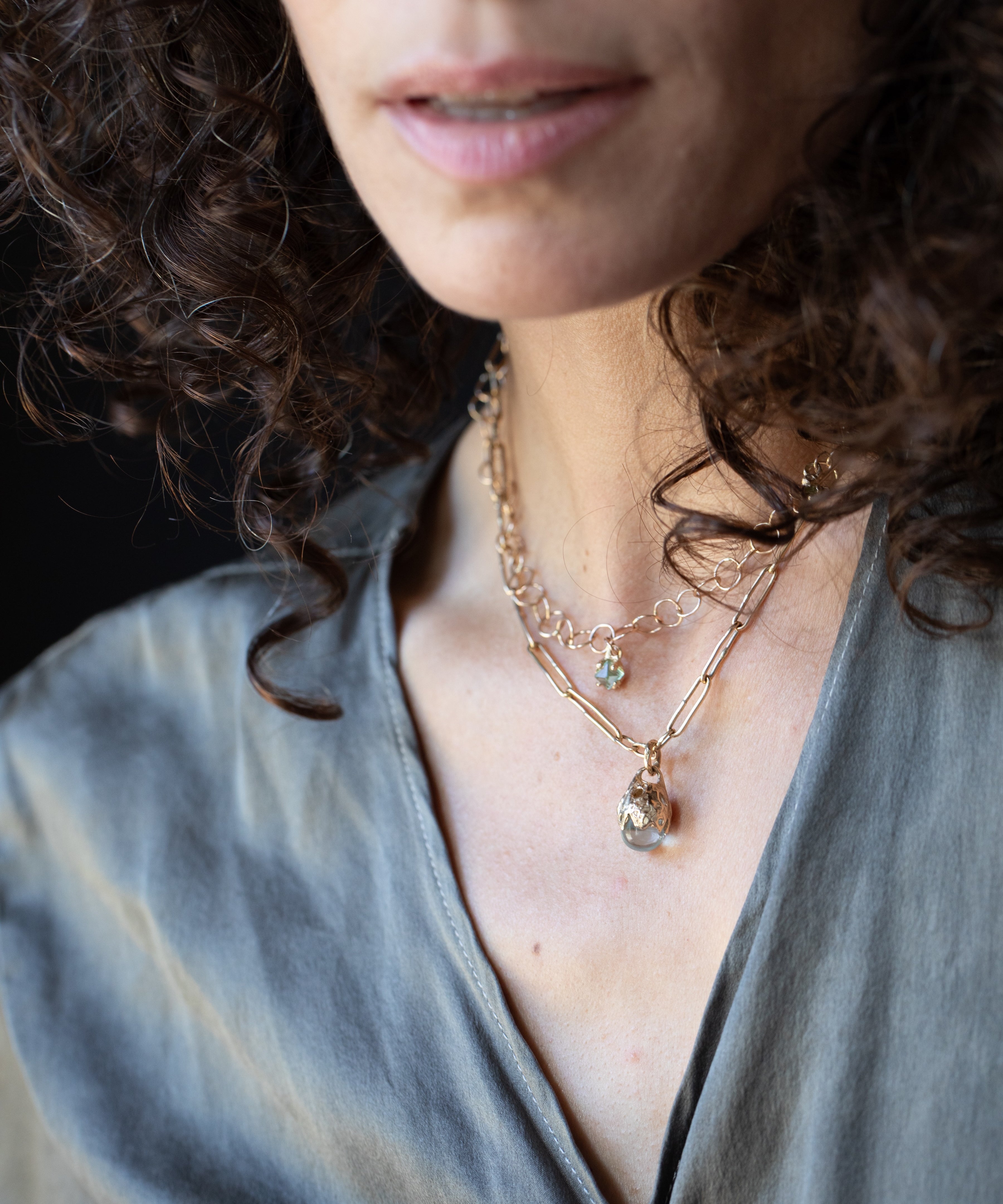 SPERO Pendant worn on neck, sculptural lost wax cast detail