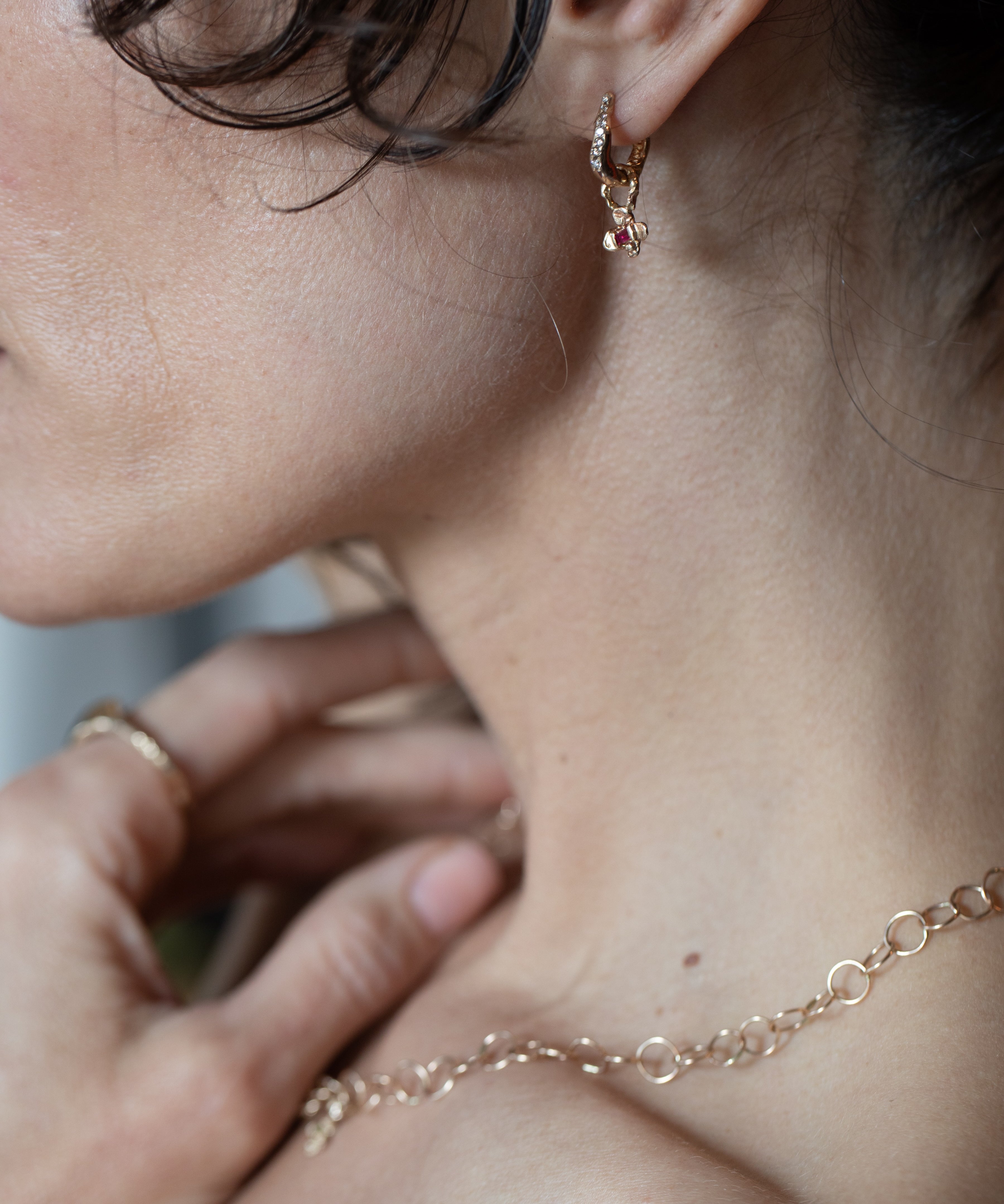 TILDA Diamond Huggie Hoop Earrings texture close-up showing lost wax cast detail, 14K Fairmined gold