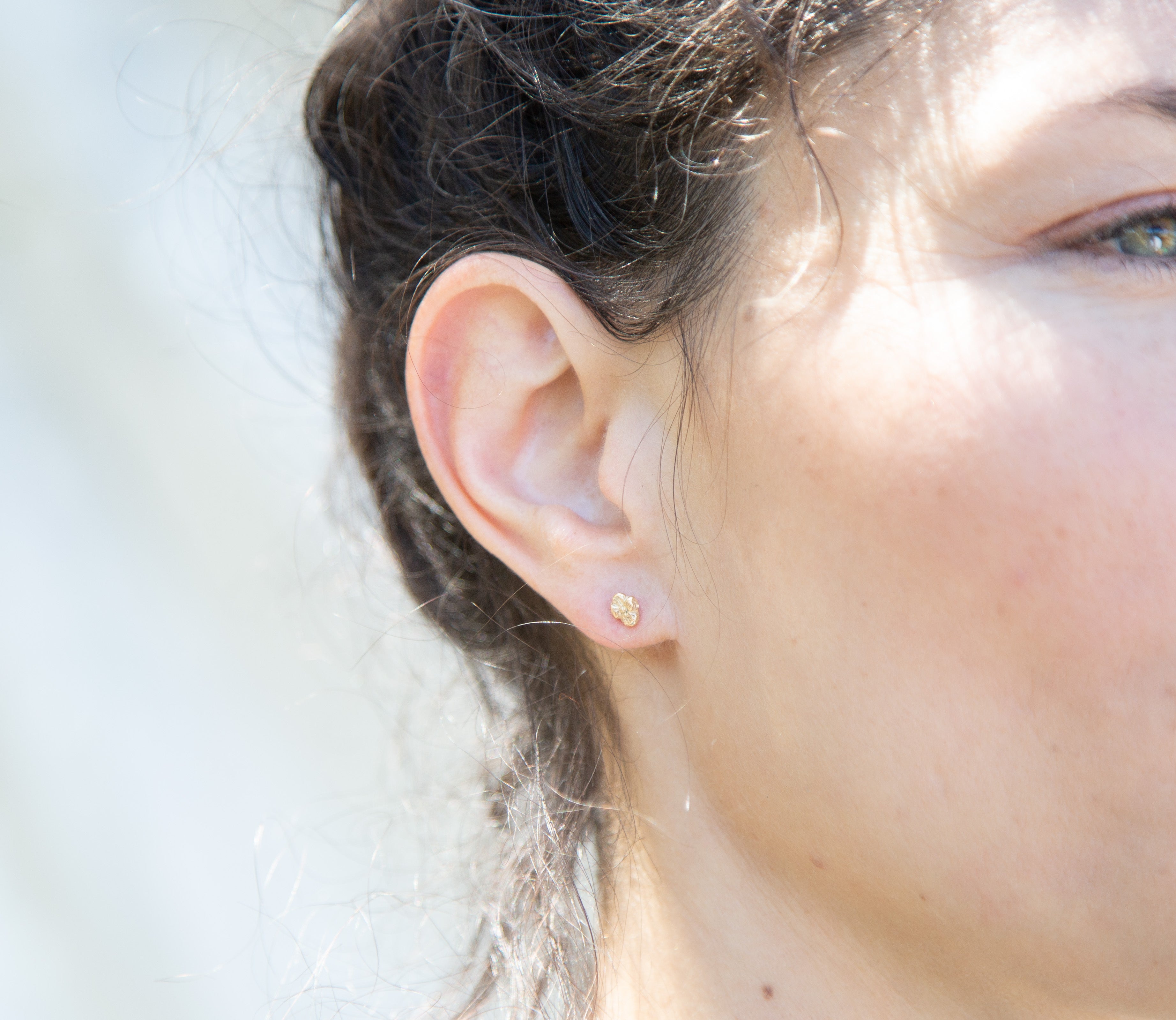 Model Wearing IDUN MINI Stud Earrings with Elegant Style